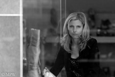 lady in shop window, high st Auckland.